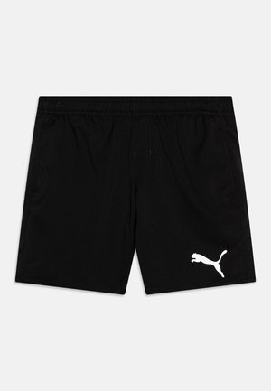 Czarne spodenki sportowe wykonane z lekkiego materiału. Posiadają elastyczny pasek w talii oraz biały logo Puma na dolnej lewej stronie.