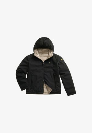 Veste noire à capuche avec doublure intérieure matelassée beige, fermeture éclair à l'avant, deux poches zippées et un patch logo jaune sur la manche gauche.