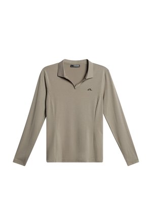 Overhemd met lange mouwen en kraag, gemaakt van lichtbeige stof met een gladde textuur, voorzien van een klein zwart logo op de borst.