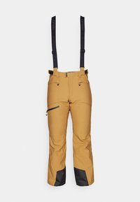 Gule snøbukser med sorte justerbare seler. Har glidelås-lommer og sorte detaljer ved mansjettene. Rett ben-design. Vanntett materiale.