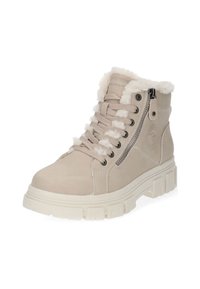 Beige vysoké tenisky s silnou podrážkou, plyšovým bílým podšívkou, tkaničkami, bočním zipem a vyraženým kulatým logem na vnější kotníku.