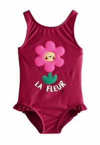 Himbeere Badebekleidung mit einer rosa Blumenapplikation mit einem lächelnden Gesicht, grünem Stängel und dem Text "LA FLEUR"; Rüschenkante an den Beinausschnitten.