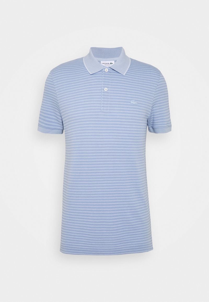 Striped polo shirt in light blue, short sleeves, with a collar and three-button placket. Cotton material with a small embroidered logo.