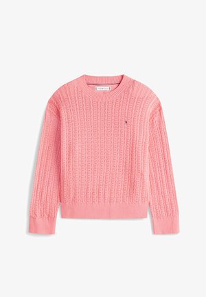 Suéter de punto cableado de manga larga en color rosa con puños y dobladillo acanalados, que presenta un pequeño logo de Tommy Hilfiger en el pecho.