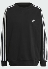 Svart sweatshirt med vita ränder längs axlarna och ärmarna. Har rund halsringning, ribbade ärmslut och en liten vit logotyp på bröstet.