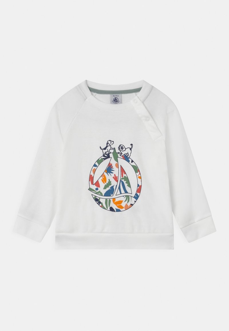 White sweatshirt with long sleeves, featuring a colorful floral design within a circular logo, and two small dogs in an embroidered detail.