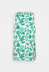 Ärmlös topp med en vit bakgrund och ett livfullt grönt botaniskt mönster, inklusive blad och blommor, tillverkad av lättviktsmaterial.