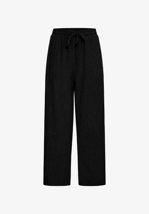 Mustad laiad püksid, mis on valmistatud tekstureeritud kangast, esitavad elastse vöökoha koos reguleeritava paelaga.