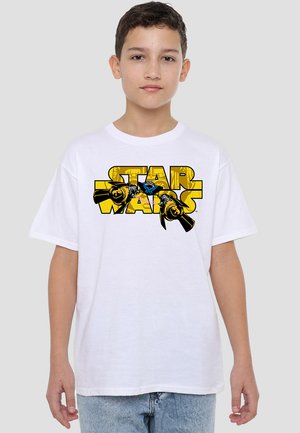 White cotton T-shirt featuring a colorful "Star Wars" graphic with yellow text and black accents. Relaxed fit and short sleeves.