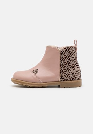 Children's ankle boot in light pink leather with leopard print fabric back panel, tan rubber sole, and a pull tab at the heel.