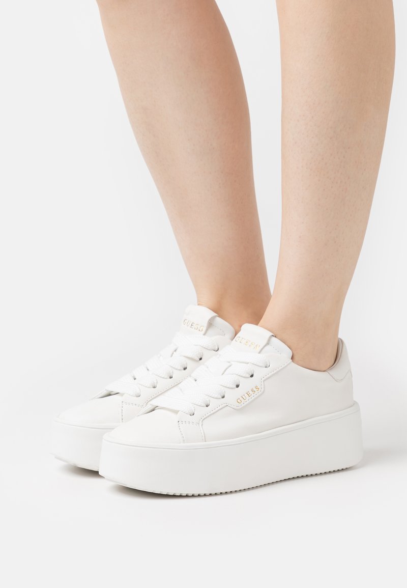 guess white trainers womens