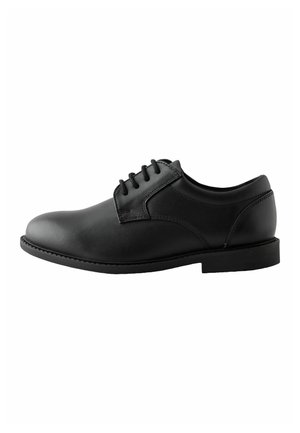 Black leather formal men's shoe with rounded toe and five-eyelet lace-up design, shown from the outer side on a white background.