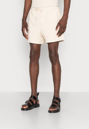 Pantalones deportivos - beige