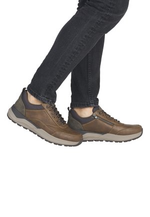 Brown leather sneakers featuring a textured finish, gray accents, lace-up closure, a zipper detail, and a sturdy rubber sole.