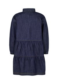 Mörkblå denimklänning med krage, långa ärmar och en flerlagerskjol. Har drapering vid midjan och elastiska ärmslut.
