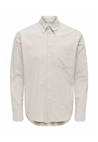 Lys beige langærmet skjorte med knapper, lavet af blød stof. Har en klassisk krave, frontlomme og afrundet kant. Standard pasform.