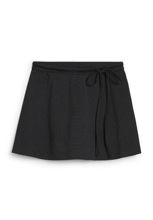 Black skirt with textured pattern, features a tied waistband, flared shape, and soft fabric. Suitable for casual wear.
