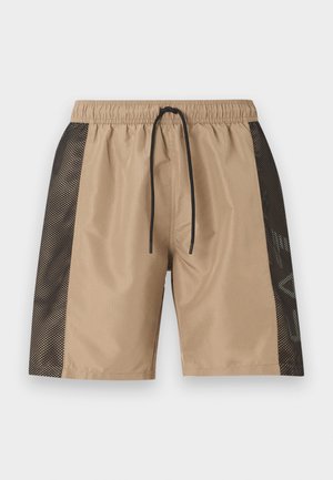 Beige Shorts mit schwarzen Mesh-Seitenteilen, elastischem Bund und schwarzer Kordel, präsentiert vor einem schlichten hellen Hintergrund.