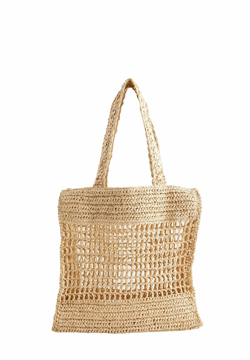 Vävd halmhandväska med rektangulär form, naturlig beige färg, öppen vävdesign och två kraftiga handtag för bärande.
