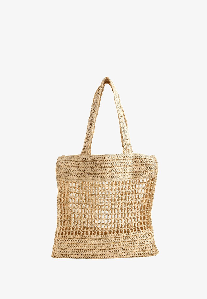 Sac en paille tissée de forme rectangulaire, couleur beige naturel, design en tissage ouvert et deux poignées robustes pour le transport.