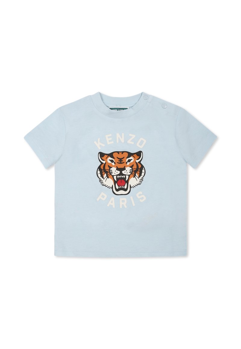 T-shirt en coton bleu clair avec un motif de tigre et le texte "KENZO PARIS" en blanc et noir, manches courtes et col rond.