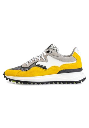 Low-top sneaker with yellow suede, gray mesh, white leather panels, black tread sole, and white patterned laces.