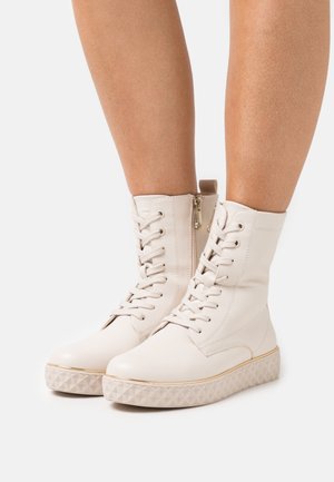 Marco Tozzi Platform ankle boots - cream