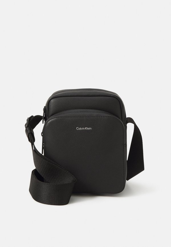 MUST REPORTER - Umhängetasche