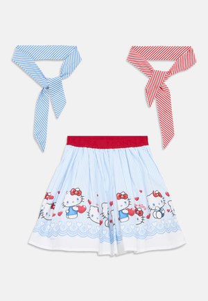 Light blue skirt with white pinstripes features a Hello Kitty print at the hem. Comes with blue and red striped ties. Elastic red waistband.