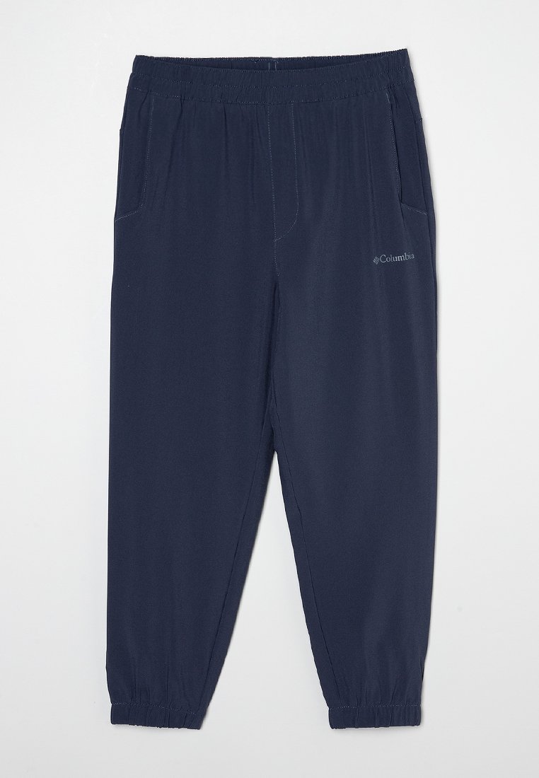 Granatowe spodnie z elastycznym pasem i mankietami, z kieszeniami po bokach i logo Columbia na prawej udzie.