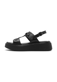 Sandalo in pelle nera con punta aperta, cinturino alla caviglia regolabile e suola in platform nera e spessa. Accenti e dettagli di cucitura in argento visibili.