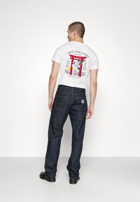 Carhartt WIP PONTIAC PANT MAITLAND - Tiesaus kirpimo džinsai - blue one wash