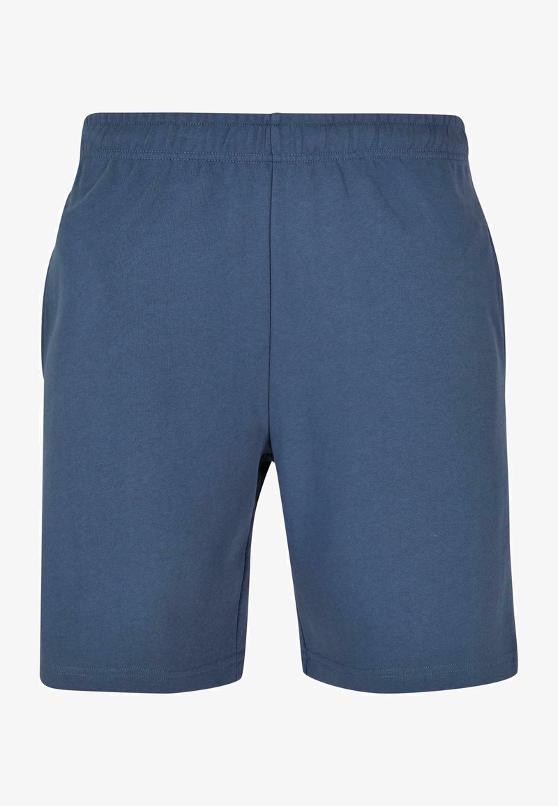 Moške modre hlače iz mehke tkanine z elastičnim pasom, ravnega kroja, brez vidnih žepov ali vzorcev.