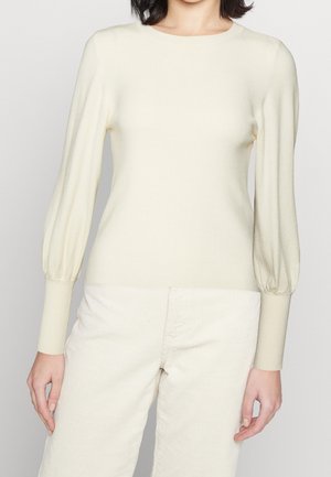 Stickad tröja - beige