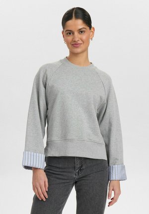 Gray sweatshirt with a crew neck, raglan sleeves, and striped fabric at the cuffs. Features a relaxed fit and soft texture.
