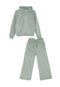 Felpa verde in velluto con tasca a marsupio e pantaloni a gamba larga abbinati, dotati di logo ricamato e vita elastica.