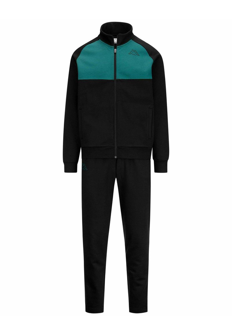 Tuta nera con giacca con zip, dotata di un pannello superiore color teal e maniche nere. Include pantaloni neri abbinati. Realizzato in materiale morbido.
