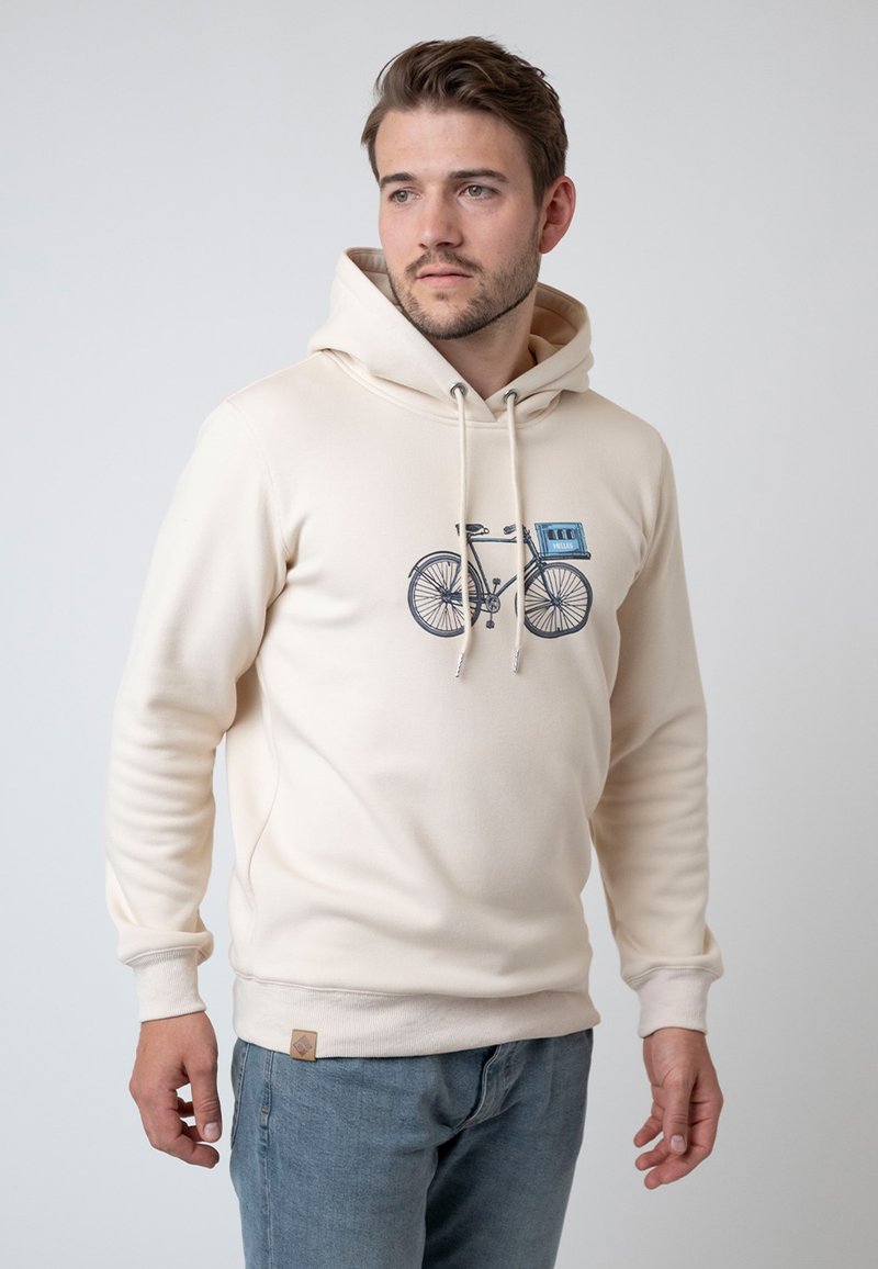 Beige hoodie featuring a bicycle graphic in blue and gray, with drawstrings and ribbed cuffs. Material appears soft and textured.
