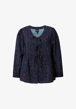 Granatowa bluzka z wzorem czerwonych kokardek, dekoltem w kształcie V i sznurkiem pod biustem. Posiada bufiaste rękawy i marszczoną talię dla swobodnego kroju.