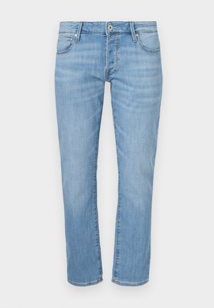 Světle modré džíny z denimu s rovnými nohavicemi, s rozepínáním na zip, pěti kapsami a jemně vybledlou texturou. Pas ve střední výšce.