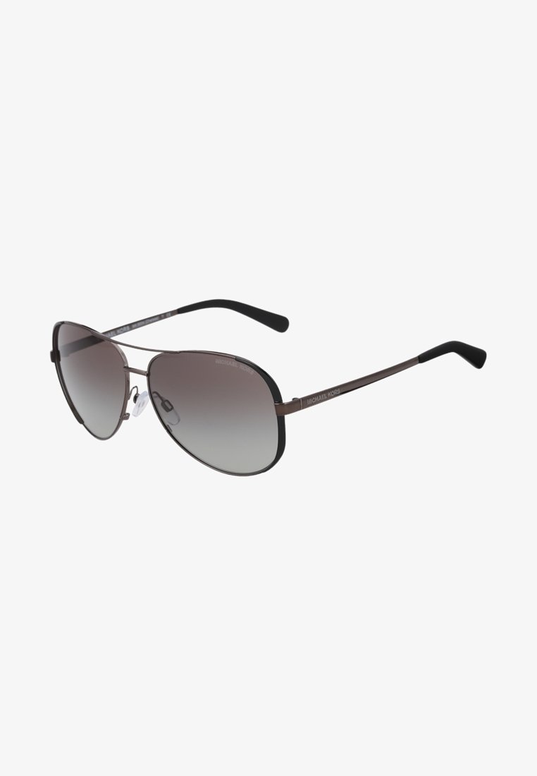 Lunettes de soleil aviateur à verres dégradés gris, monture métallique fine gris foncé, et embouts de branches en acétate noir. Équipées de plaquettes nasales pour le confort.