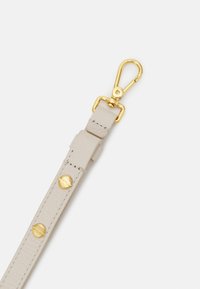Coccinelle DORIAN - Torba preko tijela - white