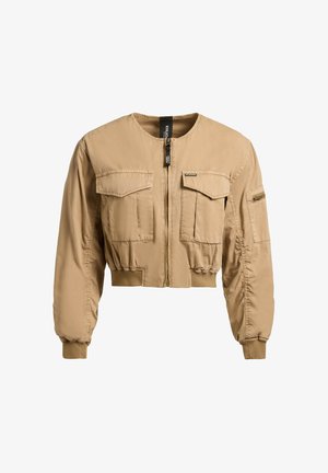 Beež lühendatud jakk esiluku, kahe klapi ja rinnataskuga, vasakul varrukal lukuga tasku ning elastsete varrukate ja vöökohtadega.