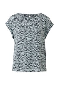 Blouse à manches courtes et coupe ample, avec un motif à pois abstrait bleu clair et noir sur le tissu, présentée sur un fond blanc uni.