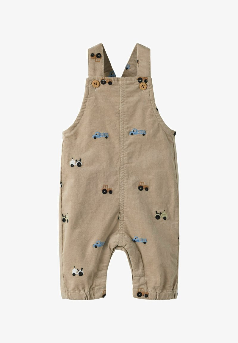 Bež volnene hlače iz korduroja z vezenimi tovornjaki in traktorji. Imajo nastavljive naramnice, lesene gumbe in zavihane nogavice. Mehka tekstura.