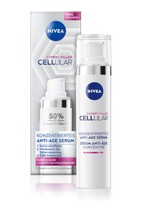 NIVEA Expert Filler Cellular serum in a sleek, cylindrical white bottle with a silver pump. Packaging features a blue logo and purple accents.