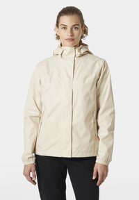 Beige lichtgewicht jack met capuchon, elastische manchetten en zijzakken met rits, gemaakt van een glad, waterafstotend materiaal.