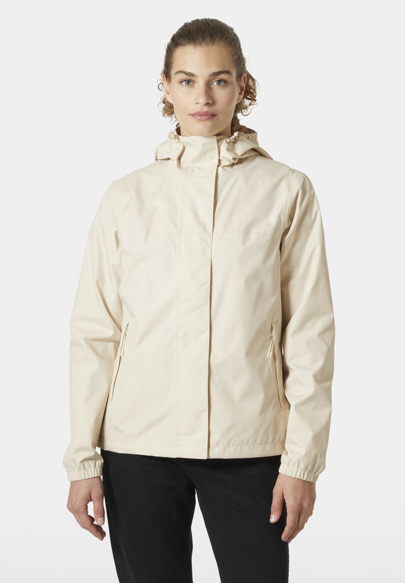 Beige lichtgewicht jack met capuchon, elastische manchetten en zijzakken met rits, gemaakt van een glad, waterafstotend materiaal.