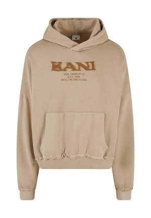 Sudadera con capucha beige con un bolsillo frontal, presenta dobladillos deshilachados y texto de marca impreso en marrón. Material de algodón suave.