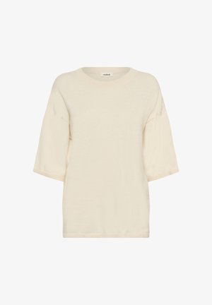 Gai krēms īsām piedurknēm tops, kas izgatavots no mīksta auduma, ar plašu apaļu kakla izgriezumu un ribotām malām. Vienkāršs, brīvs piegriezums.